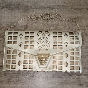 Gold cross body clutch